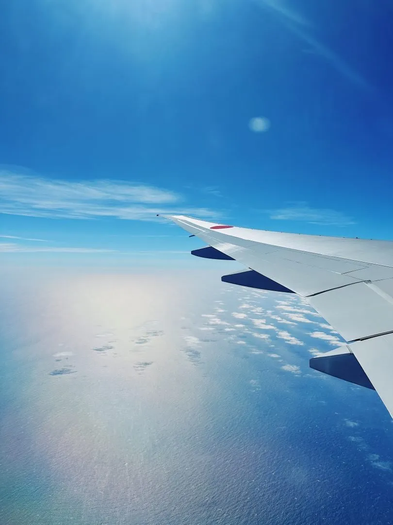 Airplane over pacific ocean on the way to japan
